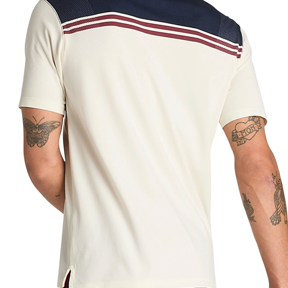 Wilson Men's All Seasons Polo in Sandrift with strategic ventilation and moisture management