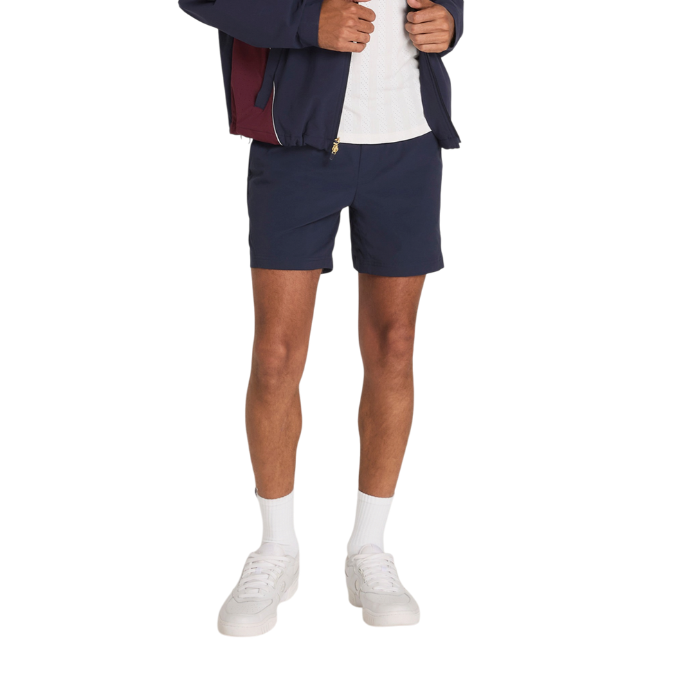 Wilson Core Grand Slam Shorts in Classic Navy with lightweight unlined construction
